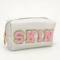 Skin Glam Cosmetic Bag Cream with Pink Letters